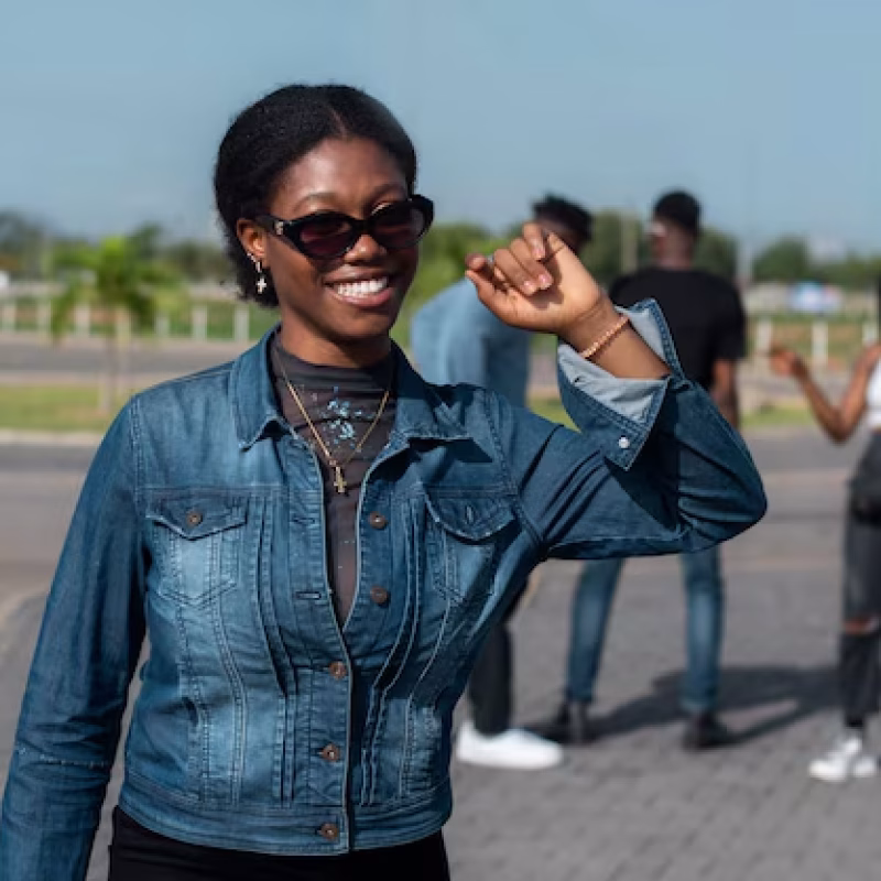 front-view-young-woman-wearing-sunglasses_23-2149452669